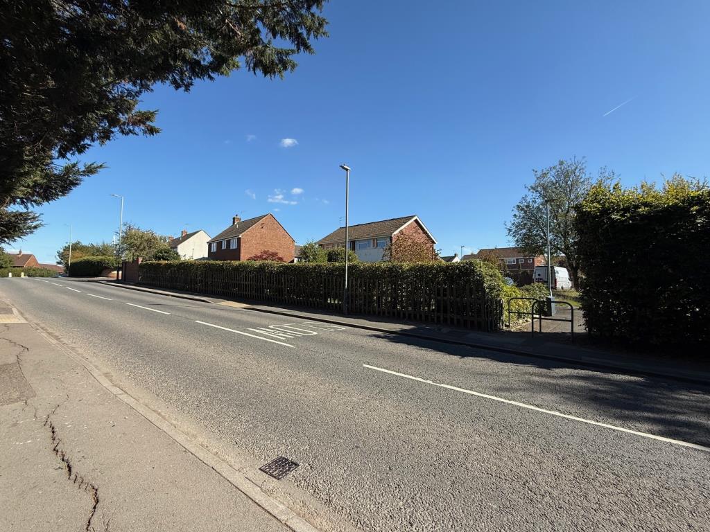Lot: 17 - LAND WITH POTENTIAL - View of the site from the main road